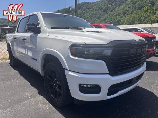 2025 RAM 1500 Laramie 4x4 Crew Cab 5'7" Box in White — front three-quarter view