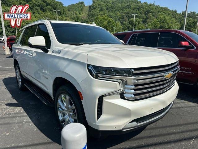 2023 Chevrolet Tahoe 4WD High Country in Iridescent Pearl Tricoat — front three-quarter view