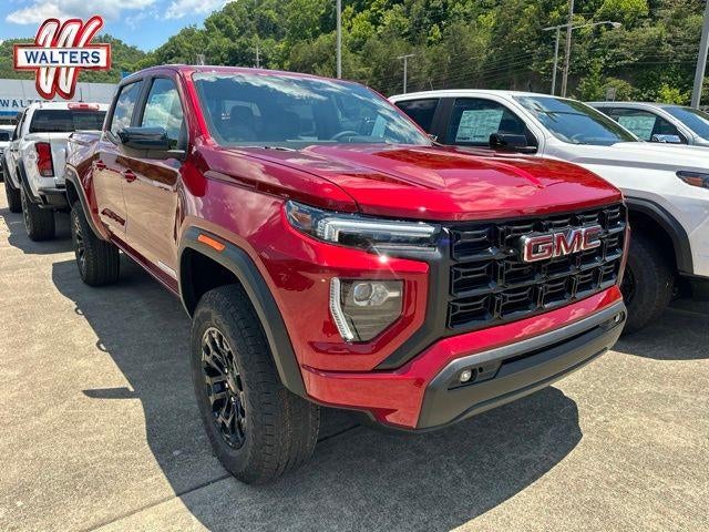 2026 GMC Canyon Elevation in Volcanic Red Tintcoat — front three-quarter view