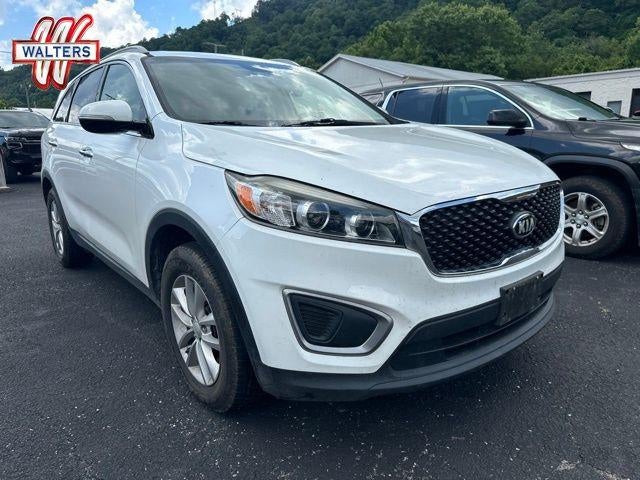 2016 Kia Sorento FWD 4dr 2.4L LX in White — front three-quarter view