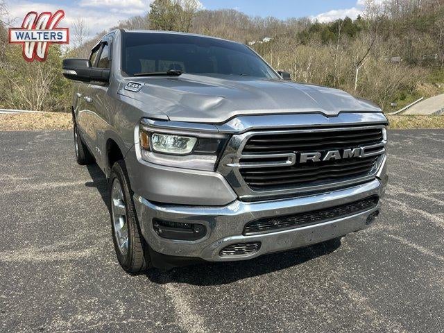 2021 RAM 1500 Big Horn 4x4 Crew Cab 5'7" Box in Billet Silver Metallic Clearcoat — front three-quarter view