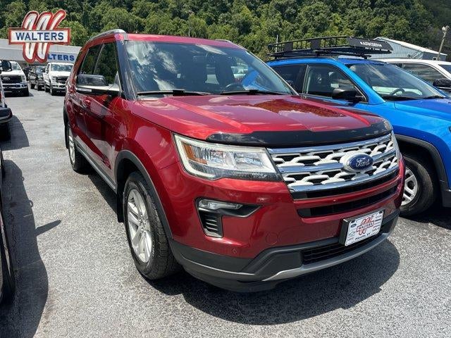 2018 Ford Explorer XLT 4WD in Ruby Red Metallic Tinted Clearcoat — front three-quarter view
