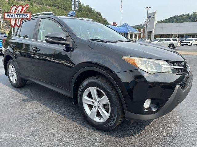 2013 Toyota RAV4 AWD 4dr XLE (Natl) in Black — front three-quarter view