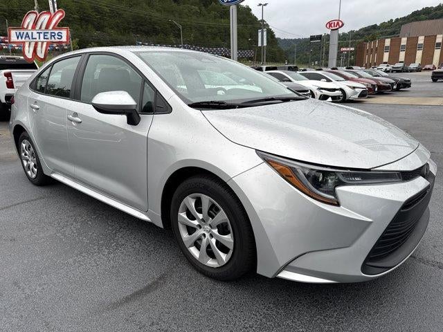 2025 Toyota Corolla LE CVT (Natl) in Classic Silver Metallic — front three-quarter view
