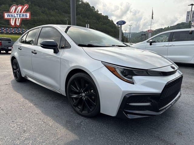 2022 Toyota Corolla SE Nightshade CVT (Natl) in Classic Silver Metallic — front three-quarter view