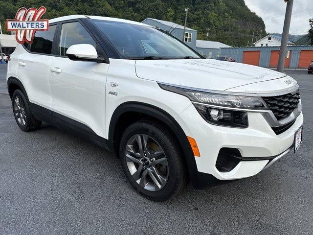 2023 Kia Seltos LX IVT AWD in Snow White Pearl — front three-quarter view