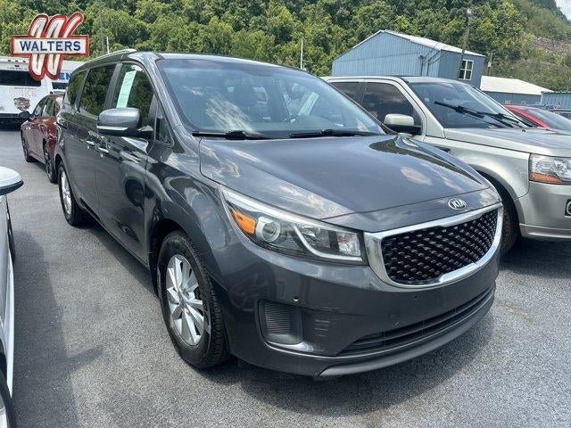 2017 Kia Sedona LX FWD in Platinum Graphite — front three-quarter view