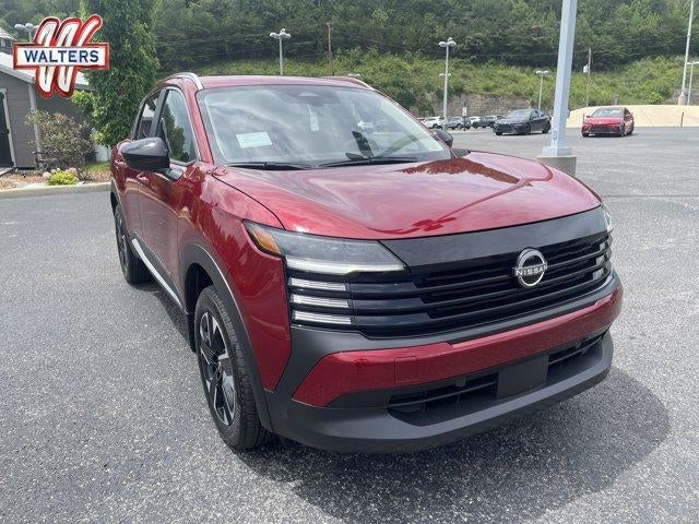 2026 Nissan Kicks SV AWD in Scarlet Ember Tintcoat — front three-quarter view