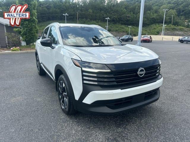2026 Nissan Kicks SV AWD in Aspen White Tricoat — front three-quarter view