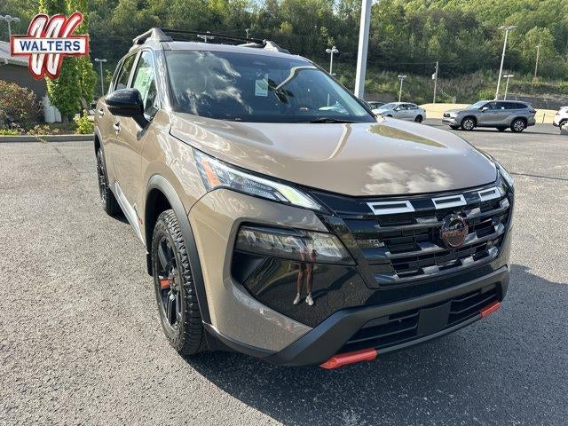 2026 Nissan Rogue 2026.5 AWD Rock Creek in Baja Storm Metallic — front three-quarter view