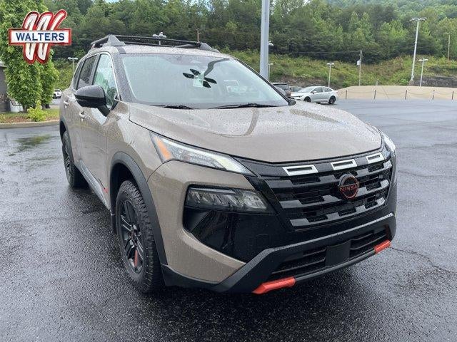 2026 Nissan Rogue 2026.5 AWD Rock Creek in Baja Storm Metallic — front three-quarter view