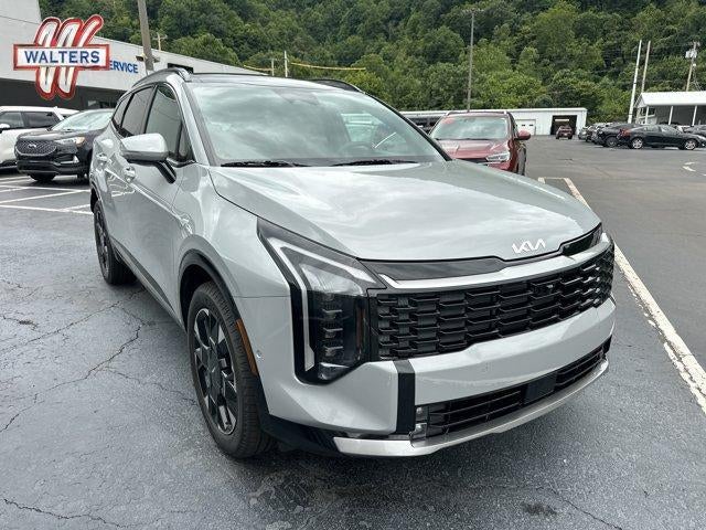 2026 Kia Sportage SX-Prestige AWD in Wolf Gray — front three-quarter view
