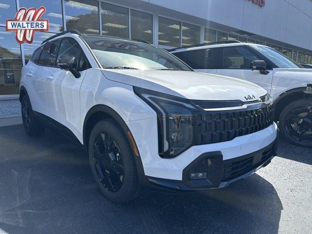2026 Kia Sportage X-Line AWD in Glacial White Pearl — front three-quarter view