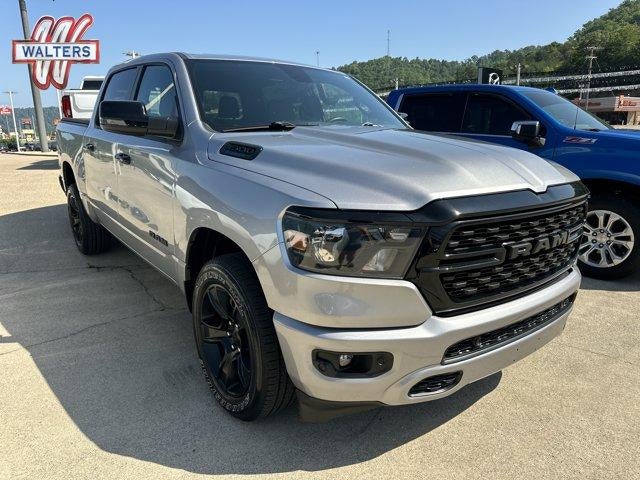 2023 RAM 1500 Big Horn 4x4 Crew Cab 5'7" Box in Billet Silver Metallic Clearcoat — front three-quarter view