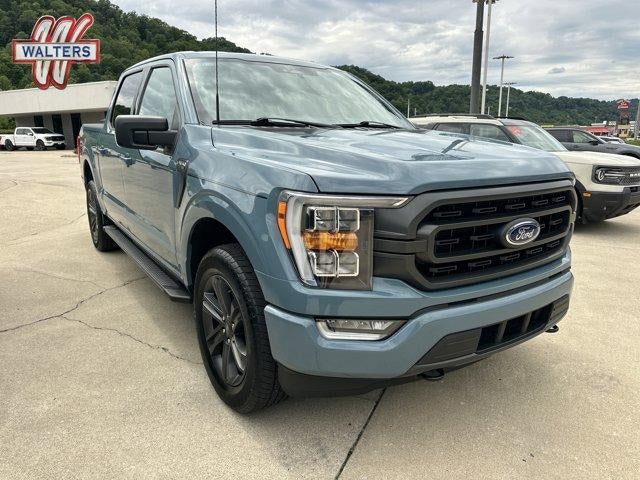 2023 Ford F-150 XLT 4WD SuperCrew 5.5' Box in Area 51 Blue — front three-quarter view