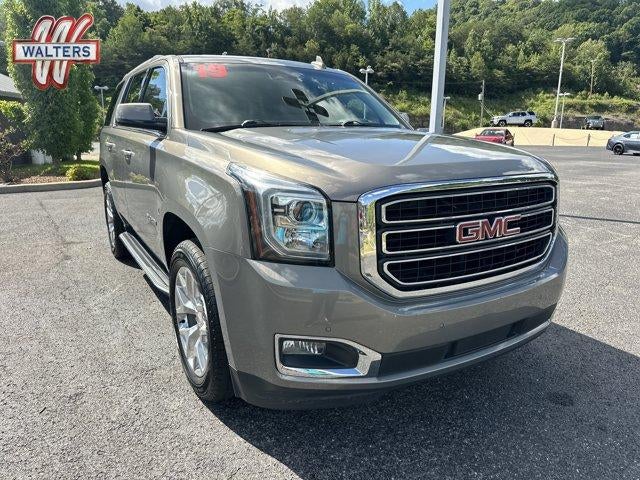 2019 GMC Yukon 4WD 4dr SLT in Pepperdust Metallic — front three-quarter view