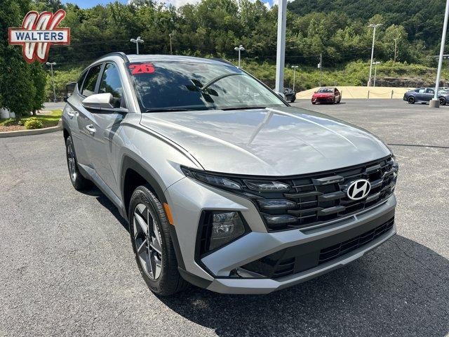 2026 Hyundai TUCSON SEL Premium AWD in Shimmering Silver — front three-quarter view